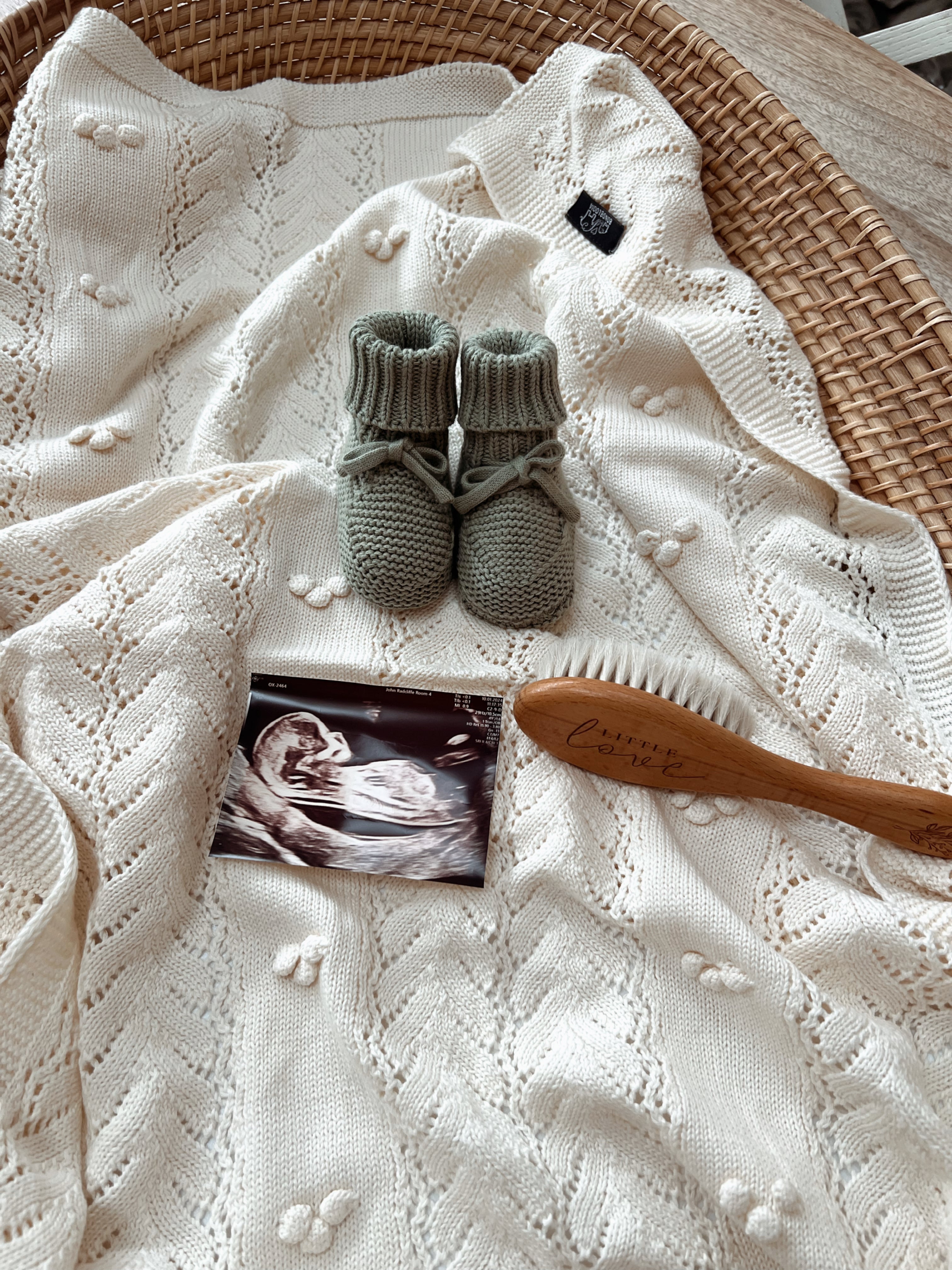 Knitted Pom-Pom Baby Blanket