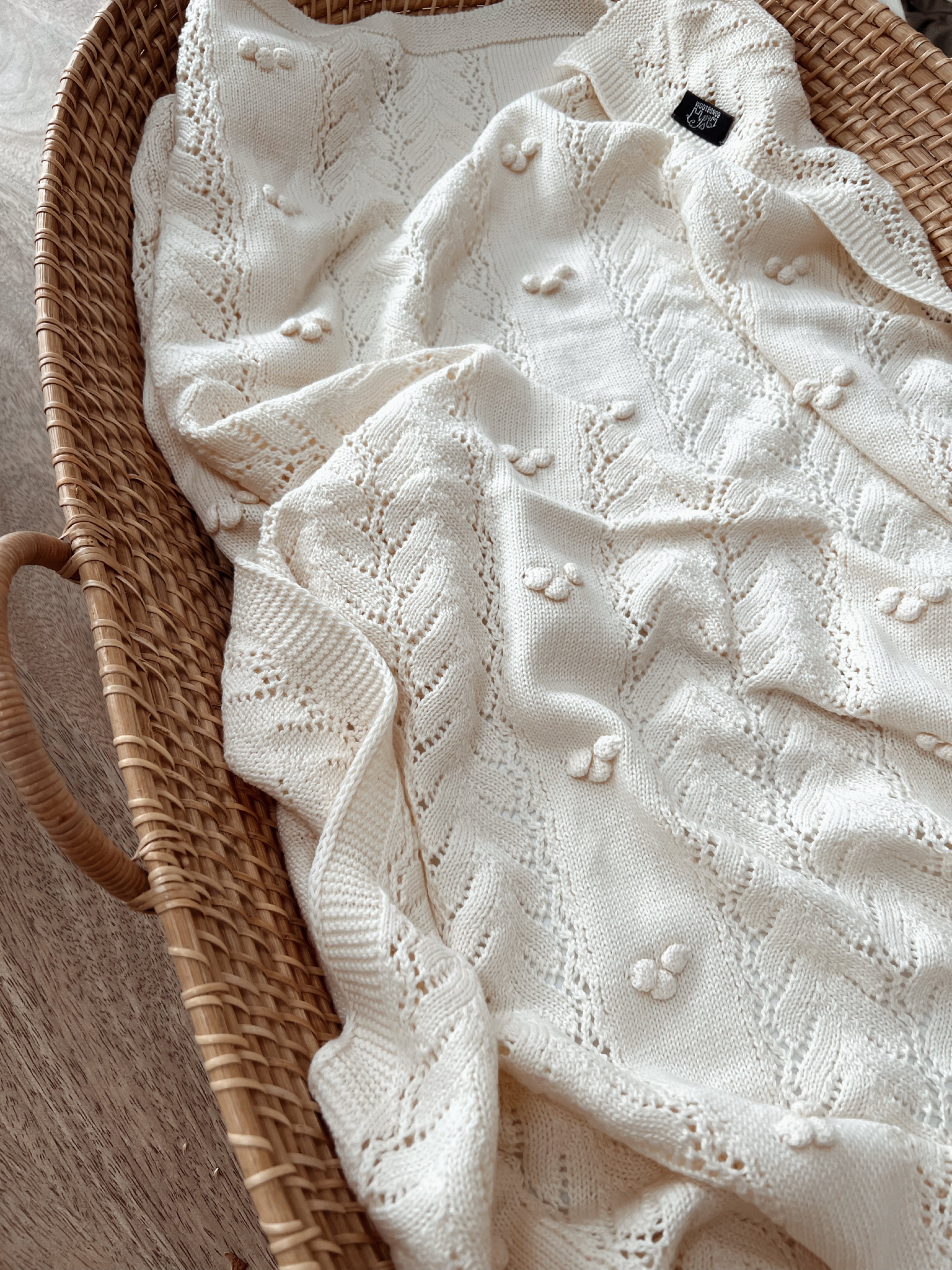 Knitted Pom-Pom Baby Blanket